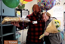  Man and woman with flowers, balloons and cookies